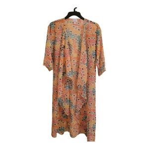 LulaRoe.  Women's Kimono.   Yellow multi colored print.  Size Small. NWT.